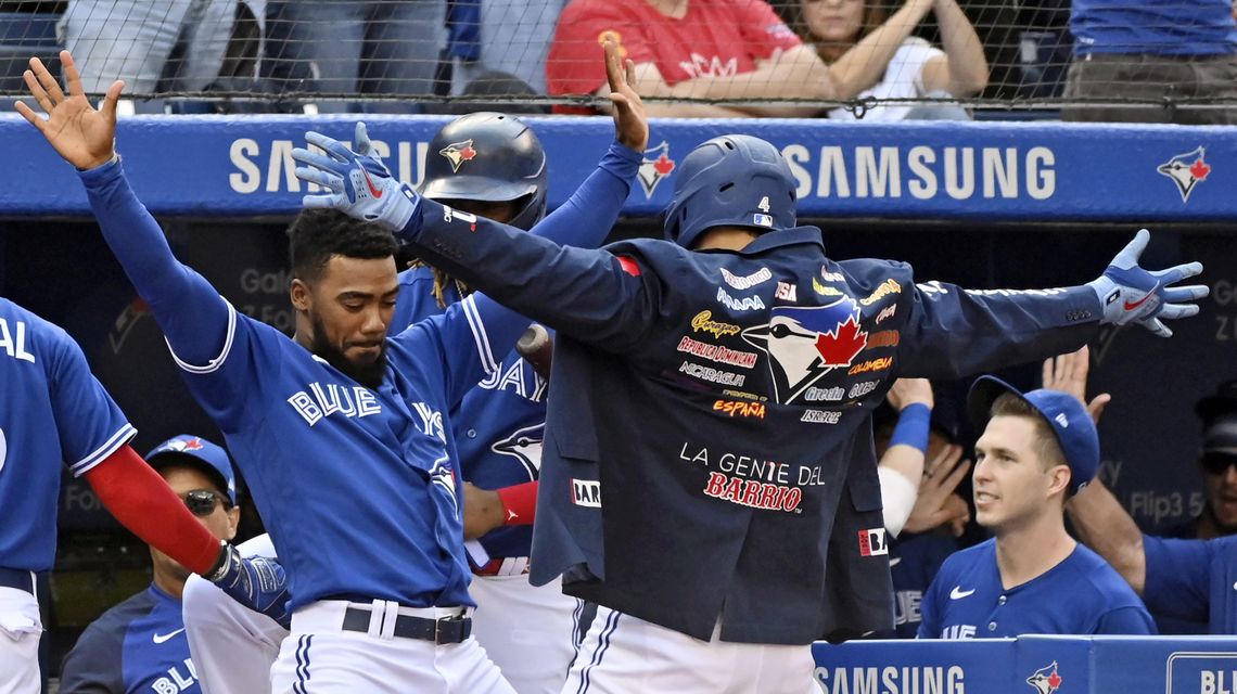 Jays stay close in wild-card race, hit 5 HRs, rout O’s 10-1
