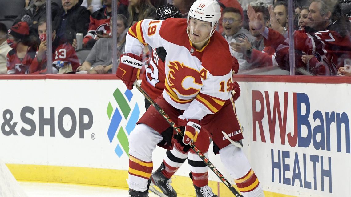 Flames use 4-goal outburst in 1st period to beat Devils 5-3