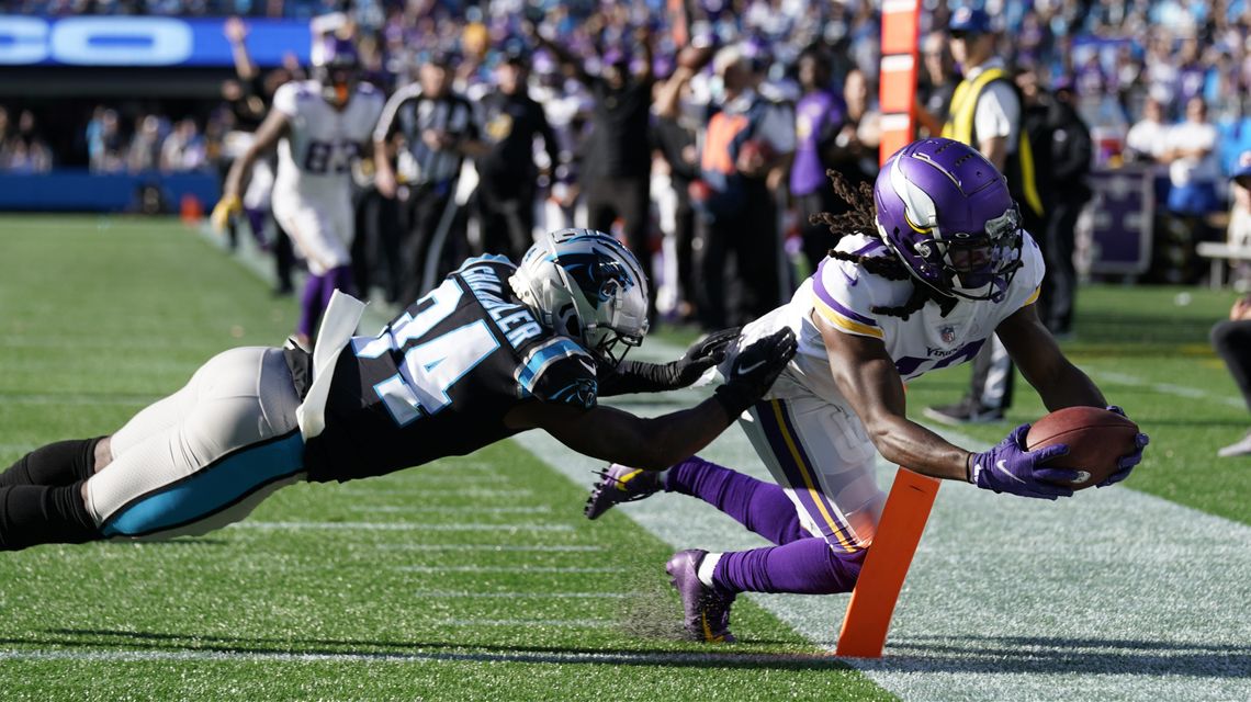 Cousins throws TD pass in OT; Vikes beat Panthers 34-28