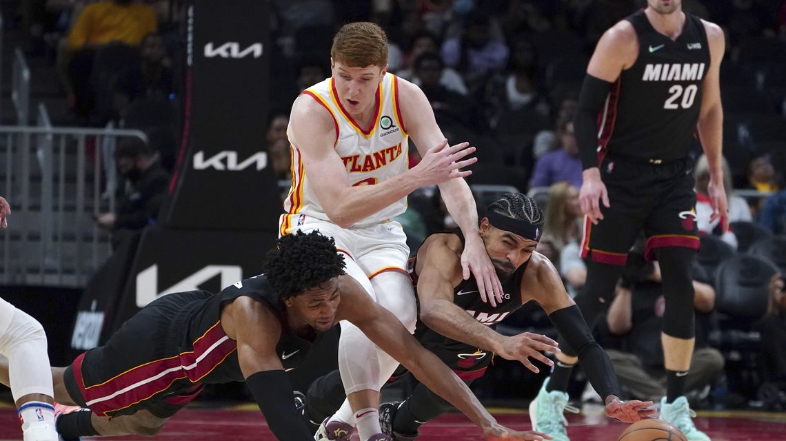Trae Young has 27 points and 15 assists, Hawks rout Heat