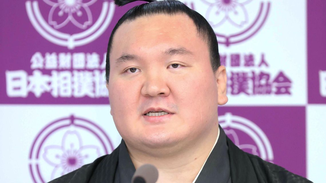 Mongolia-born sumo great Hakuho retires after knee injury