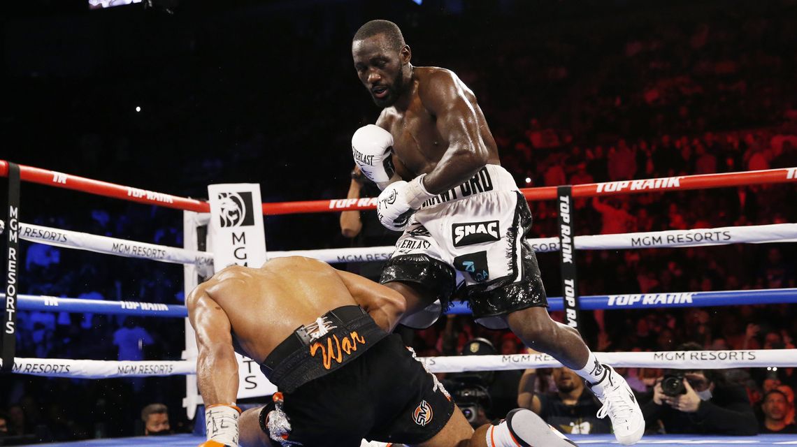 Crawford stops Porter in 10th to keep WBO welterweight title