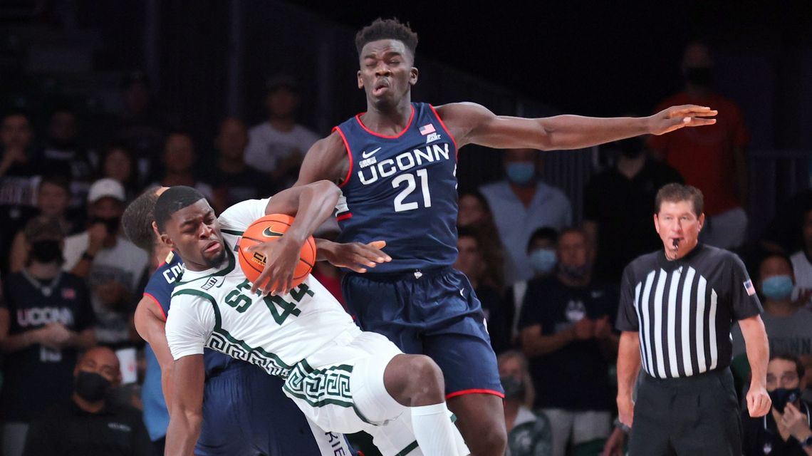 Brown, Spartans pull away late to beat No. 22 UConn 64-60