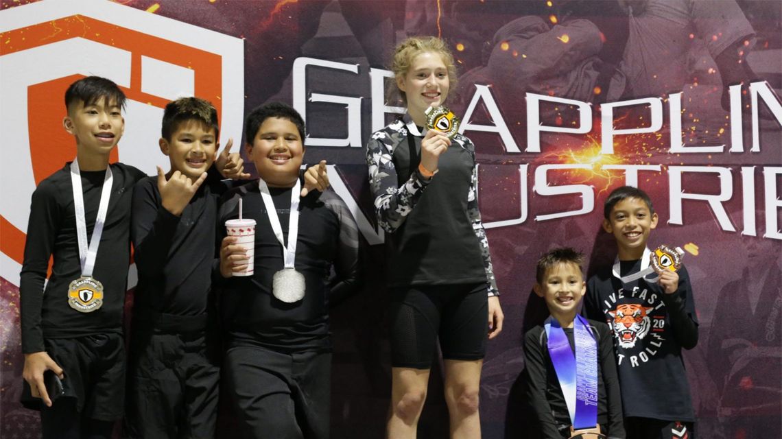 Two CA martial arts studios collaborate and send students to their first grappling competition