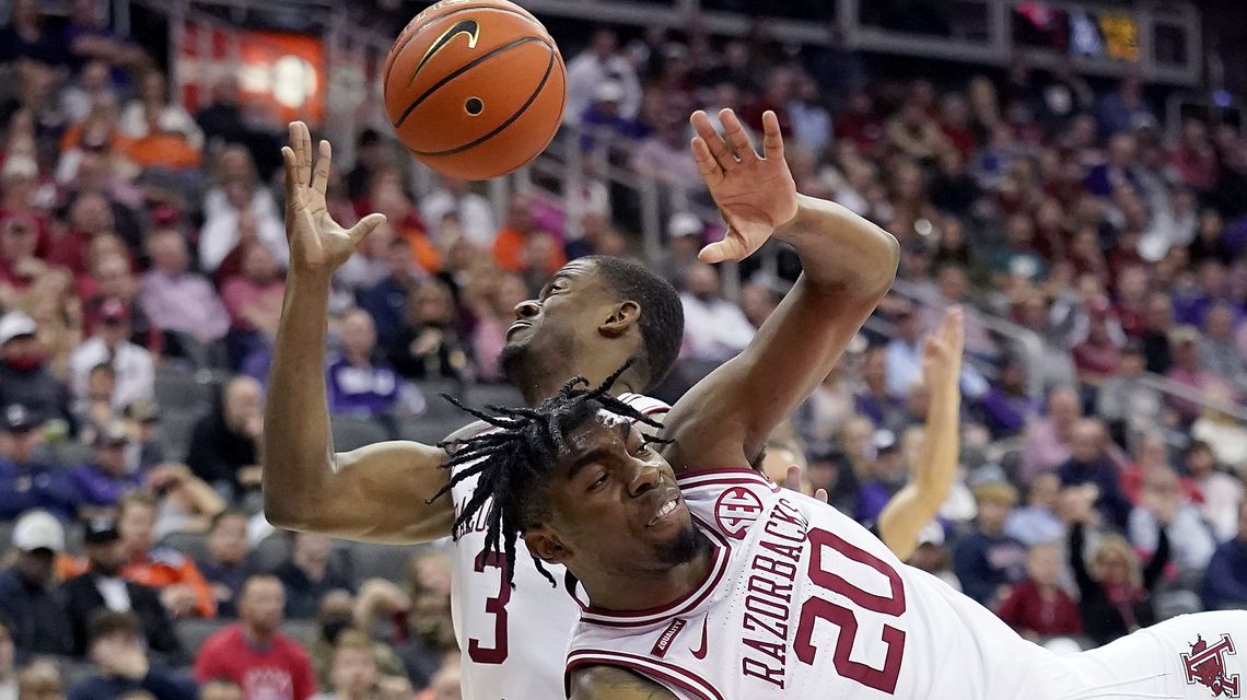 No. 13 Arkansas beats Cincy 73-67 in Hall of Fame Classic