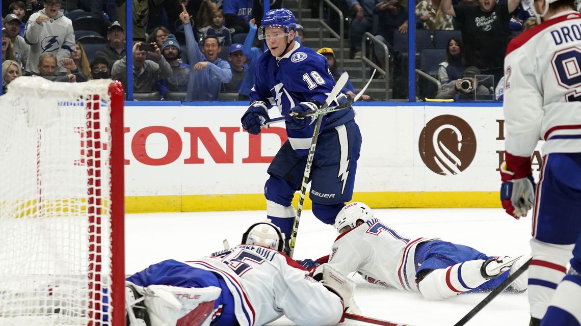 Lightning rally late, beat Canadiens in OT as NHL returns
