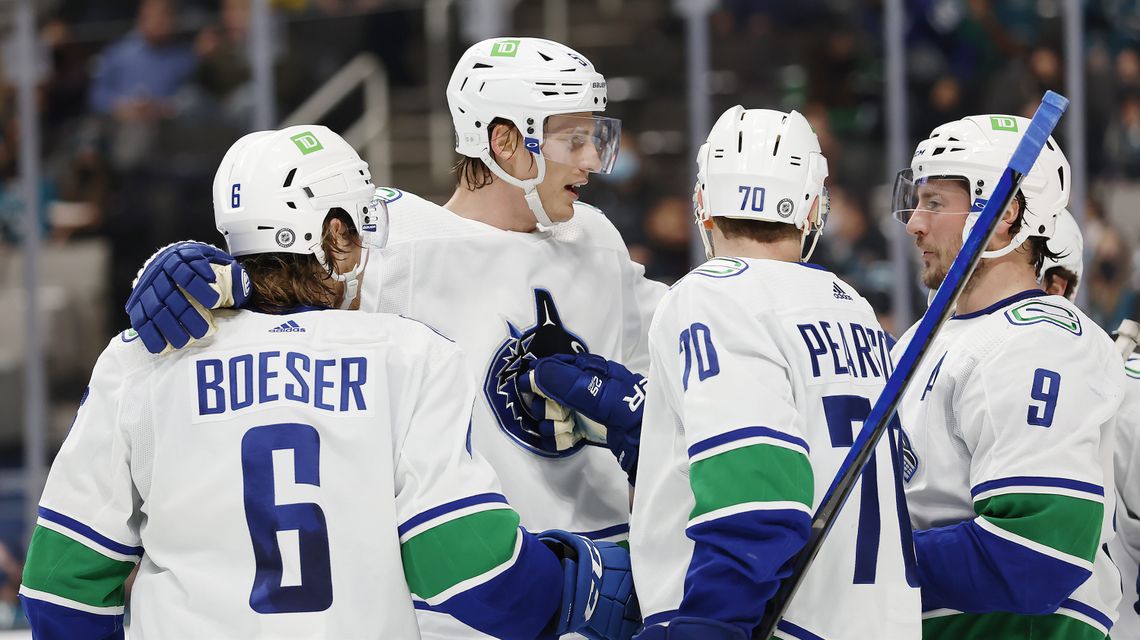 Boeser scores twice to lead surging Canucks past Sharks 5-2
