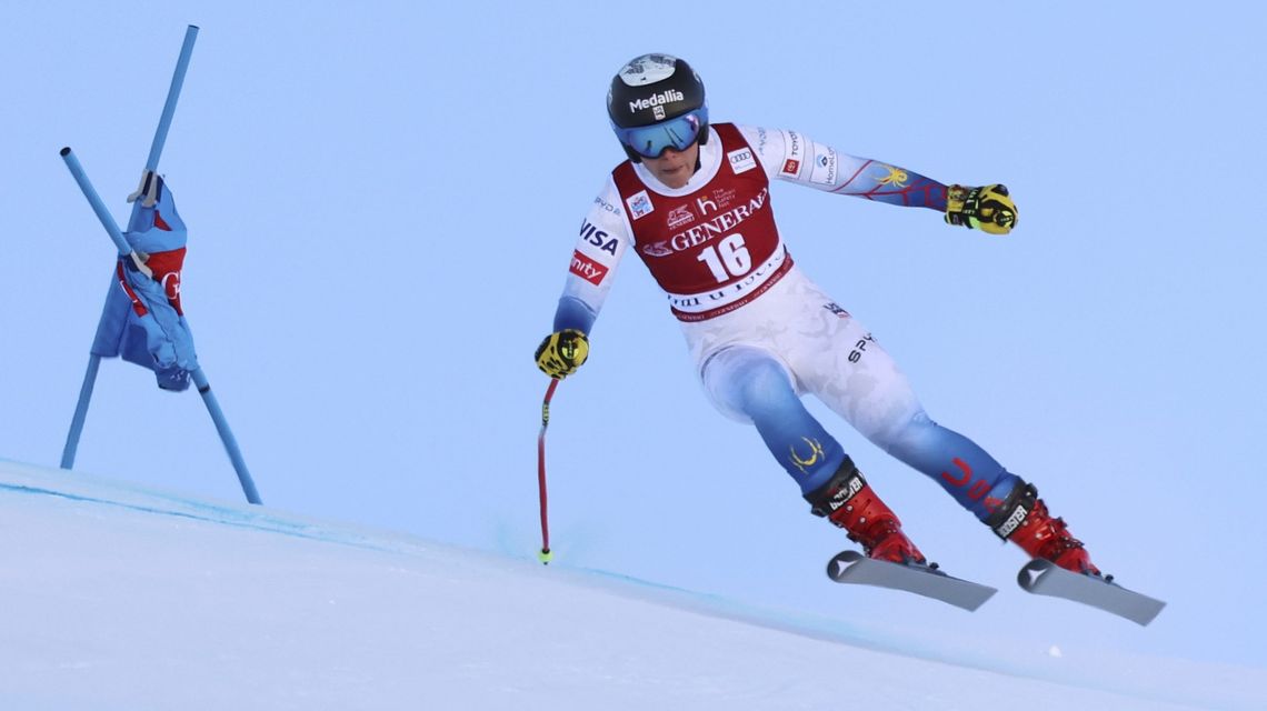 Downhill racer Johnson skips World Cup meet with knee injury