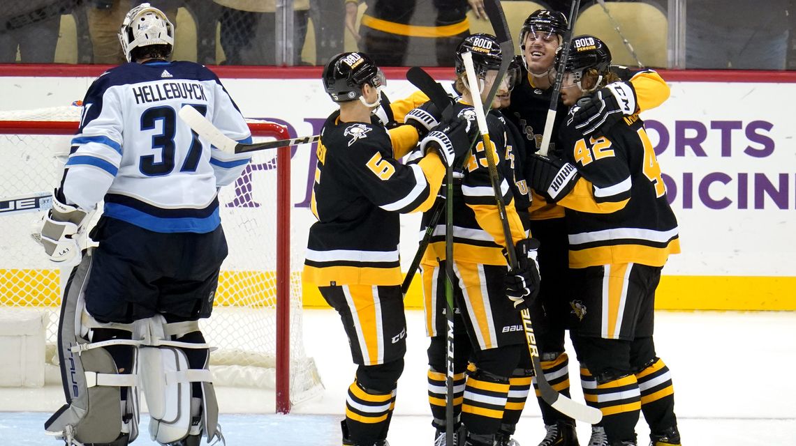 Penguins rally to beat Jets 3-2 in SO