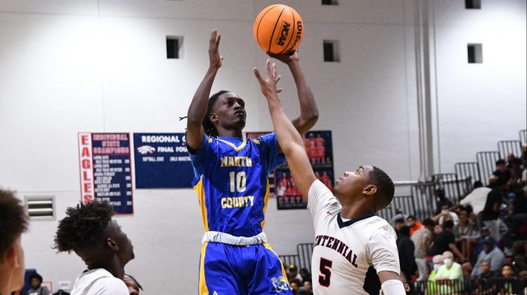 Double-overtime for Martin County Tigers boys basketball against Centennial