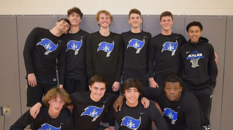 Behind the court with Atlee ballers and coach Rally Axselle