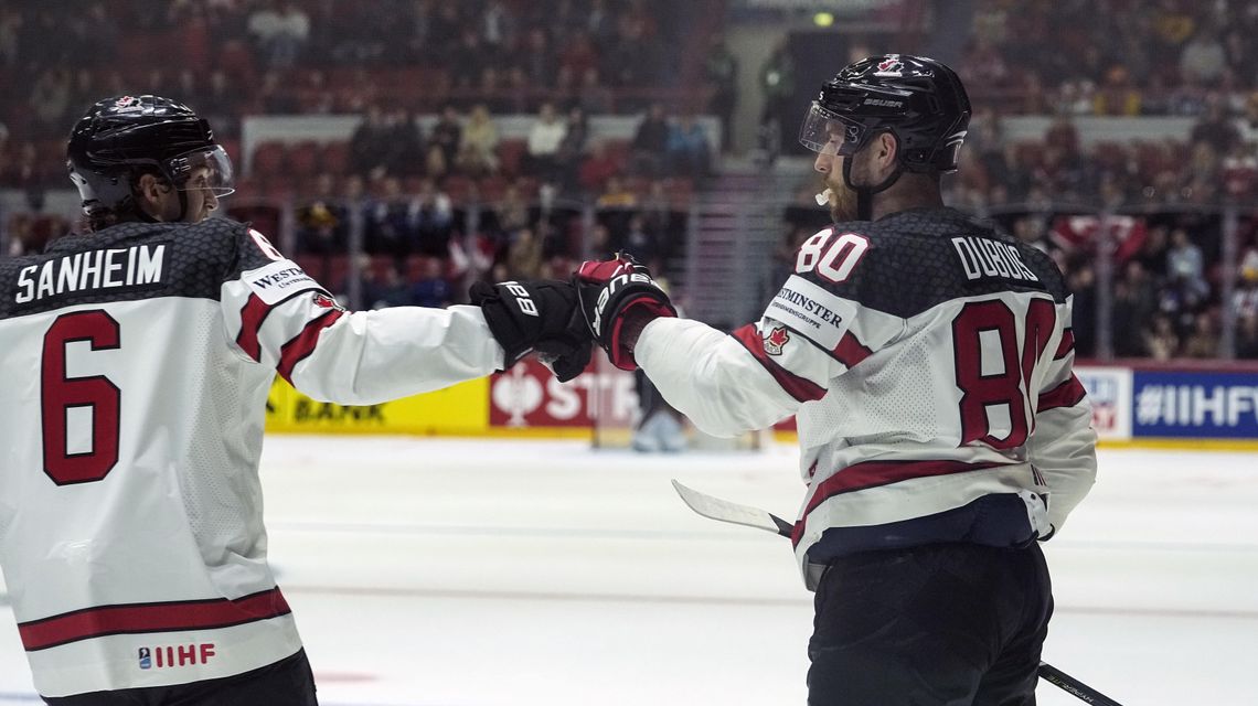 Defending champ Canada, US win openers at ice hockey worlds