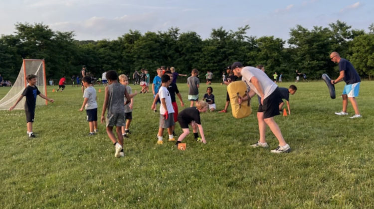 Urbana Youth Football Program sees increasing participation in latest clinic
