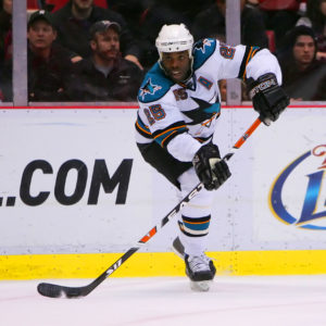Mike Grier playing for San Jose. 