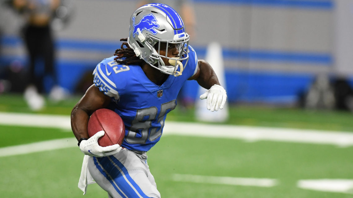 Detroit Lions wide receiver Kalil Pimpleton (83) tries to break the tackle  of Atlanta Falcons cornerback