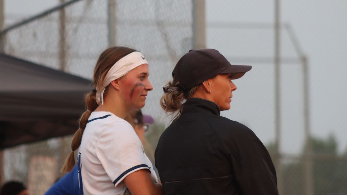 Red Deer Rage Girls U17AW softball assistant coach Teri Hunter helps