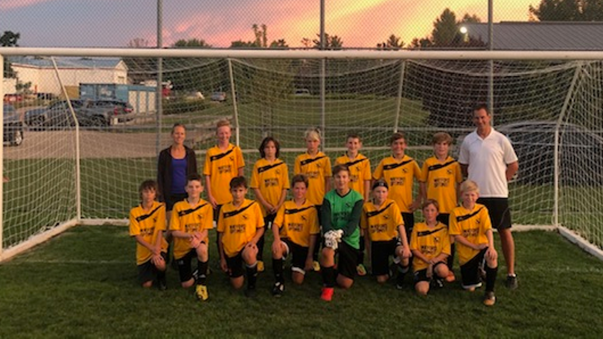 Taxandria Falcons U13 soccer team working together toward a common goal