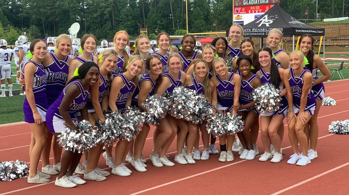 Cherokee Bluff HS football cheerleading team led by senior class