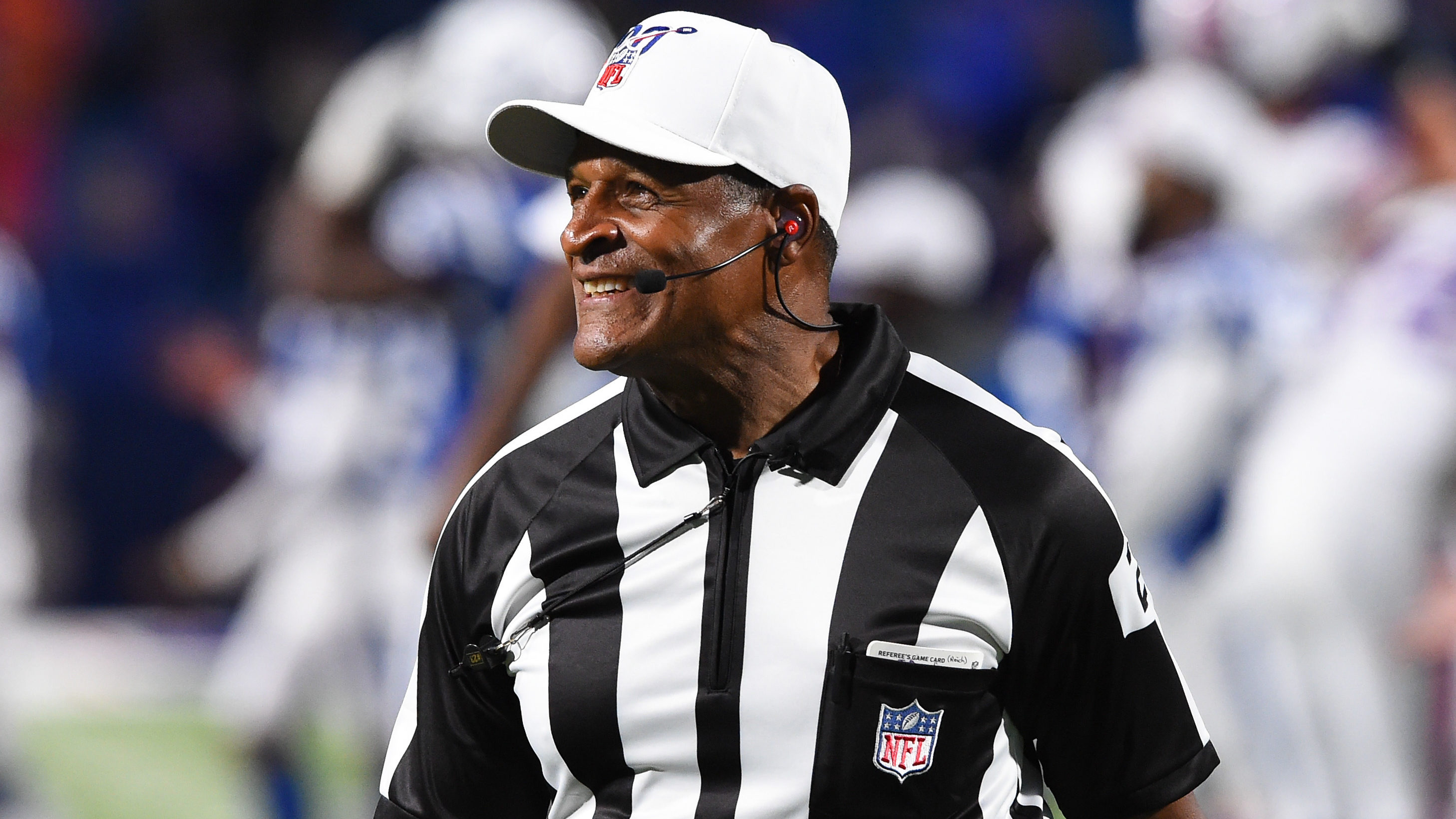 NFL referee Jerome Boger (23) watches a replay during the second half of an  NFL football game between the Minnesota Vikings and the Washington  Commanders, Sunday, Nov. 6, 2022, in Landover, Md. (