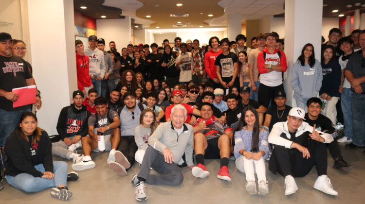 Two Rio Rico High School seniors sign their letters of intent