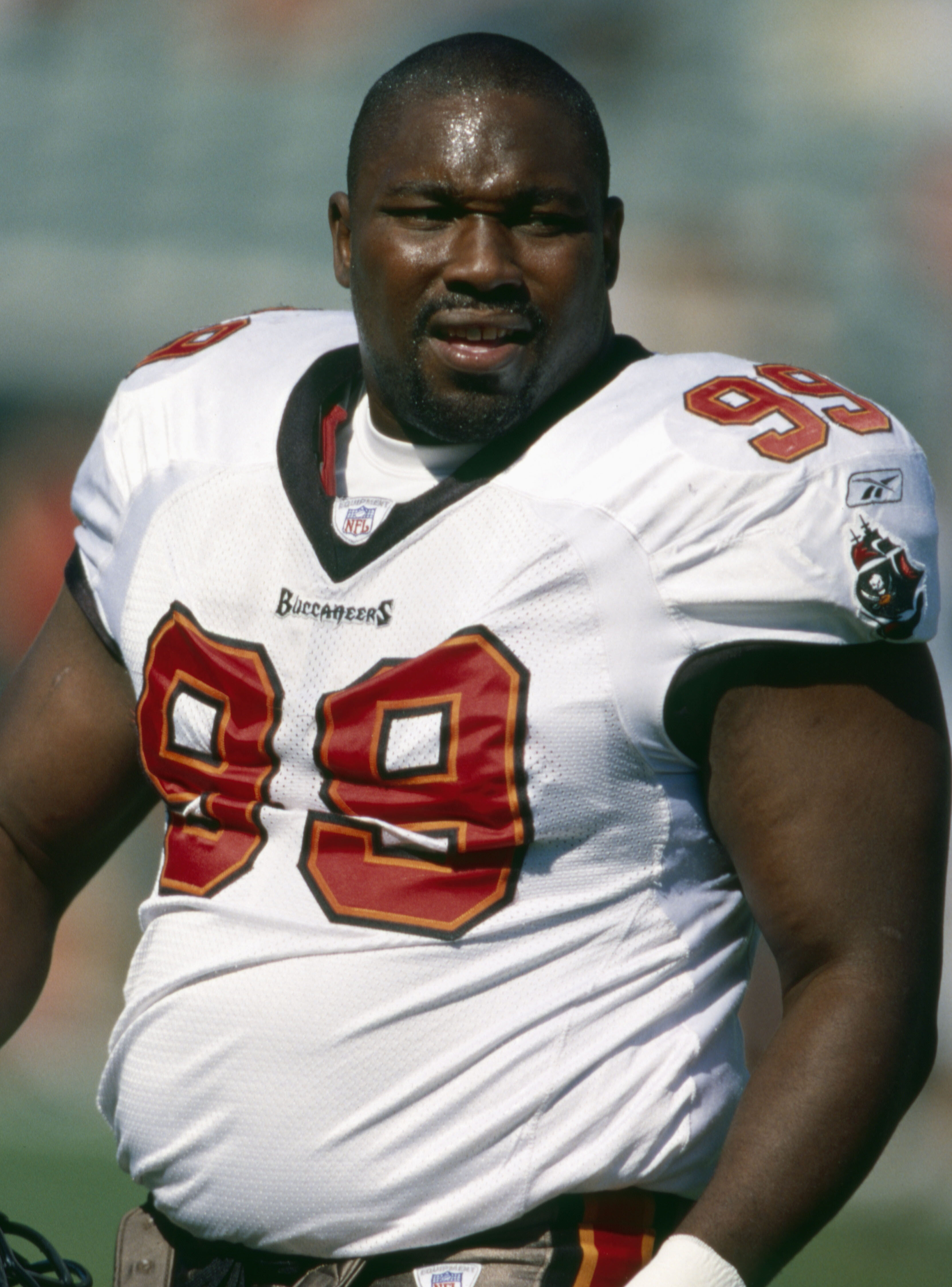 Former Tampa Bay Buccaneers defensive lineman Warren Sapp watches