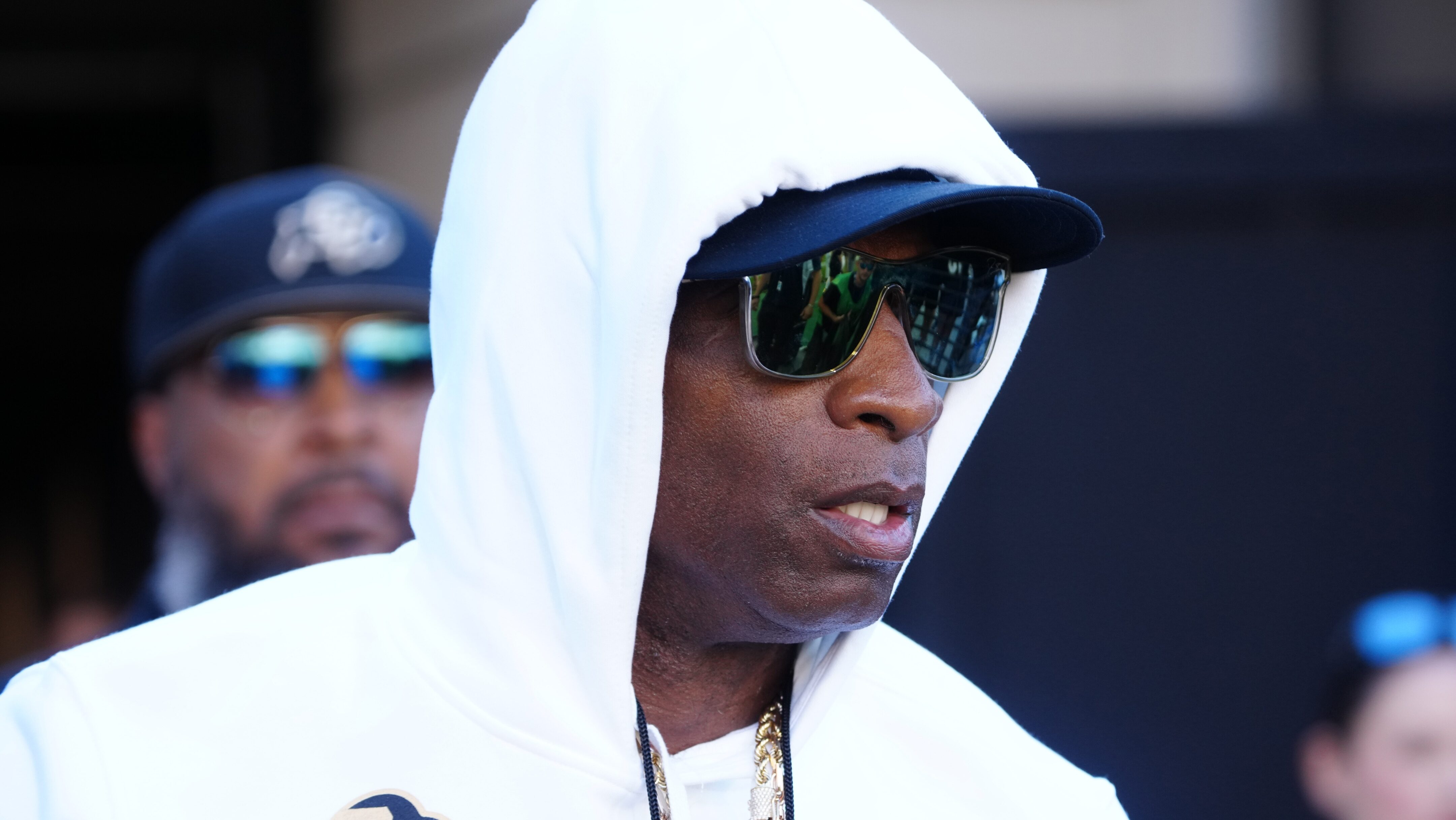 WATCH: Deion Sanders gives sunglasses to Colorado players in apparent jab  at Colorado State coach Jay Norvell 