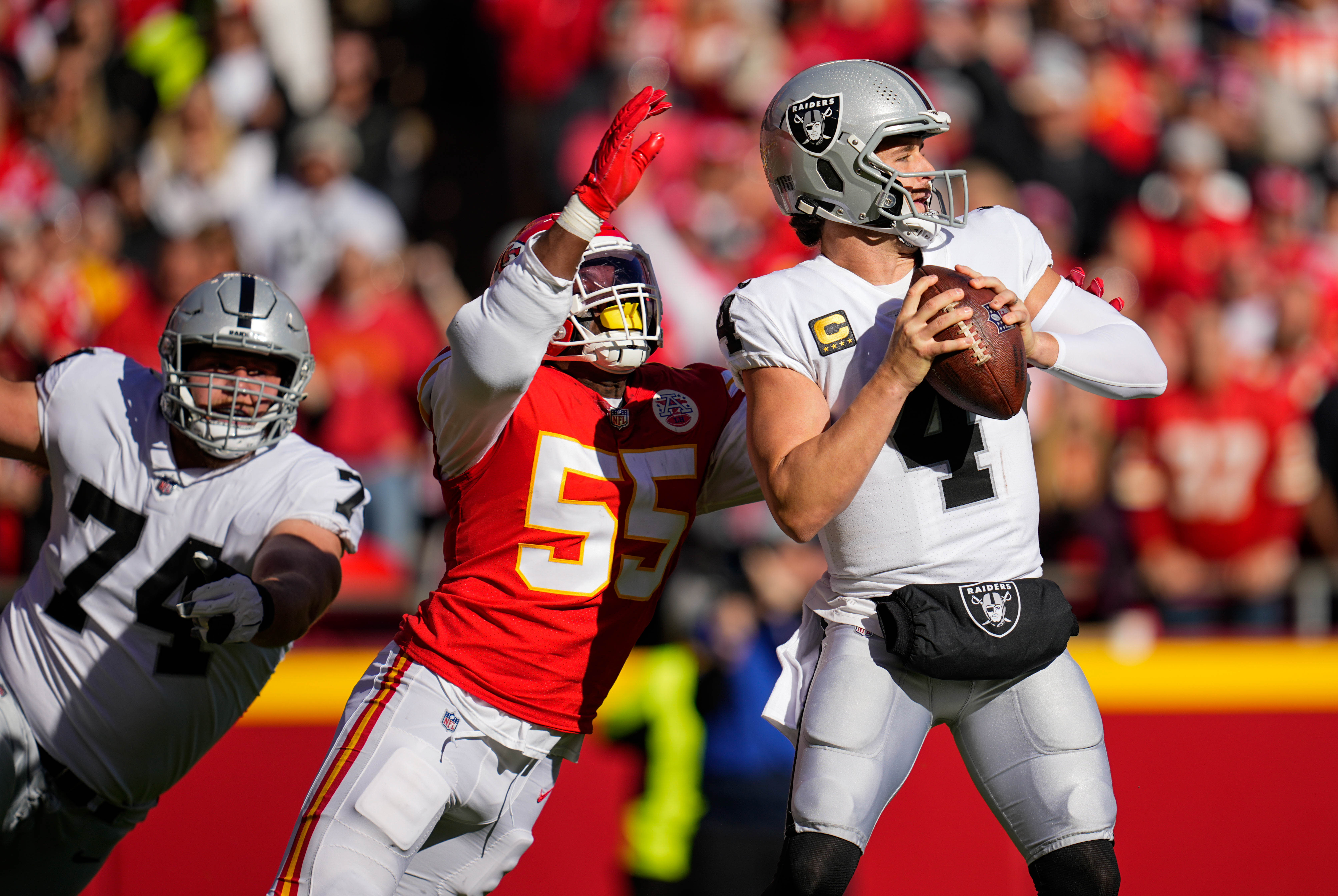 Kansas City Chiefs defensive end Frank Clark (55) rushes on