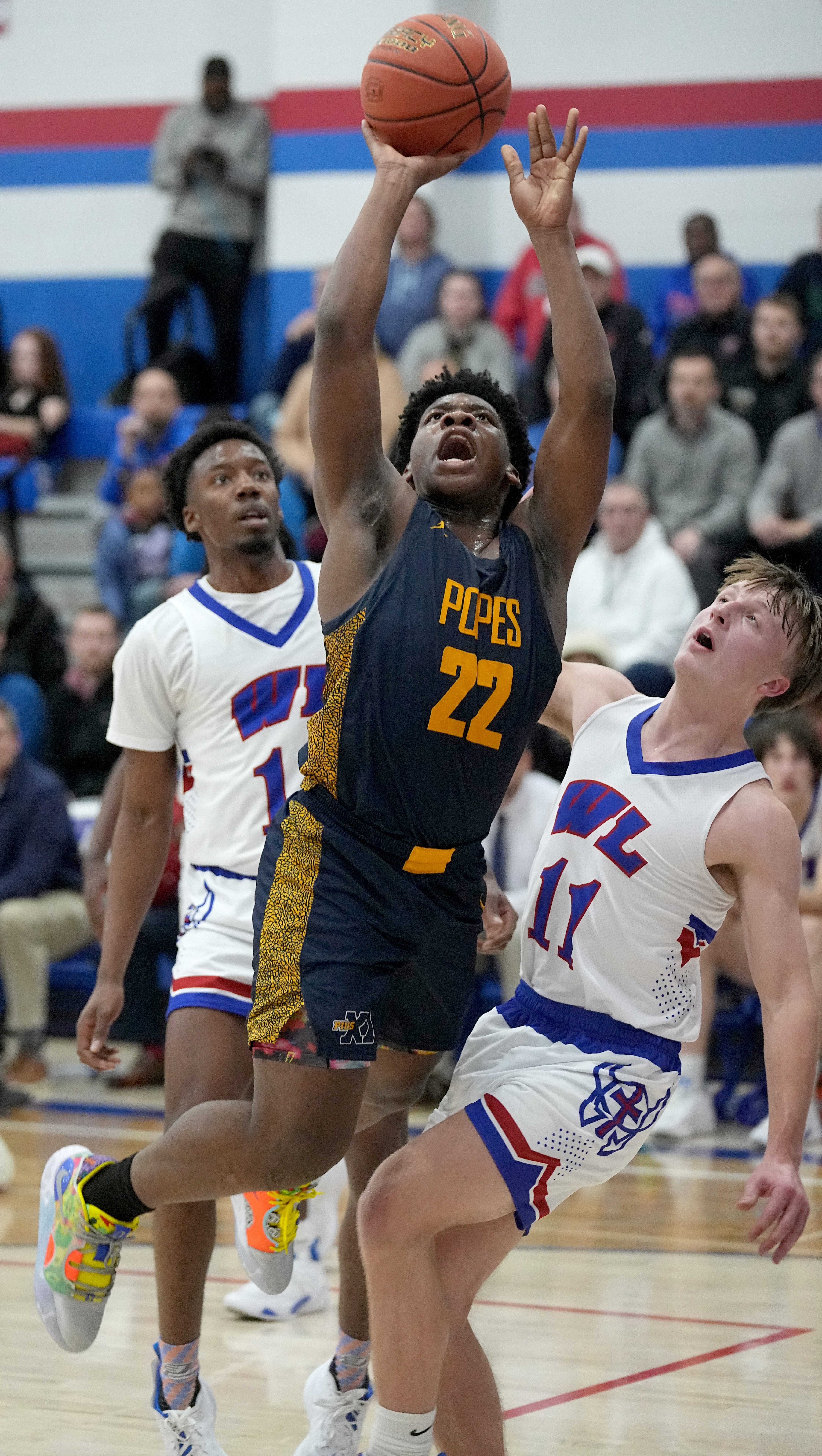 wisconsin basketball Jaquan Johnson pius popes milwaukee