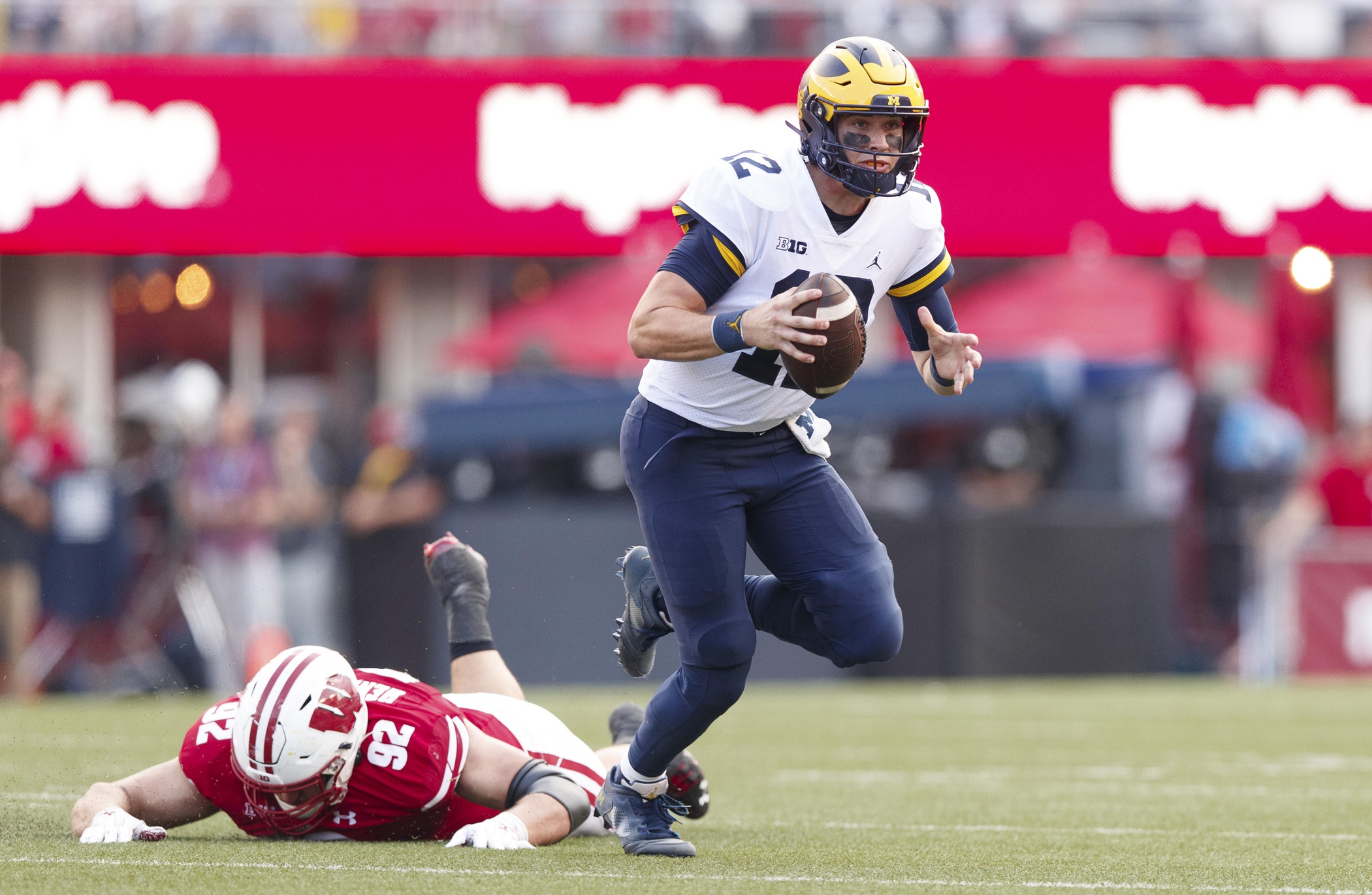 Cade McNamara Michigan Wolverines Iowa Hawkeyes NCAA college football transfer portal landing spots Wisconsin Badgers