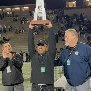 When football is family, players thrive: Poway Titans football coach Brandon Harris brings a winning strategy